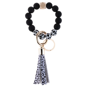 Cow print beaded keychain bracelet with silicone beads, wood bead and leather tassel