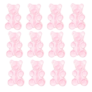 Close-up of twelve translucent pink resin bear charms for DIY jewelry making