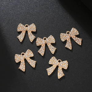 Set de 5 colgantes de lazo dorado con diamantes de imitación para joyería artesanal