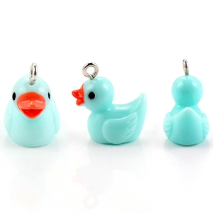 Three-view display of cute light blue resin duck pendants with silver metal rings for DIY jewelry