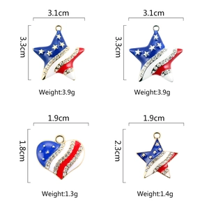 Detailed view of American flag heart and star pendants with rhinestones and enamel finish