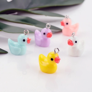 Mini resin duck pendants in mixed pastel colors for DIY jewelry making and crafts
