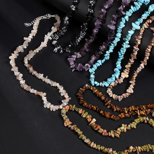 Detail of natural stone fragment necklaces with silver lobster clasp and extension chain