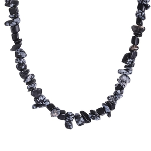 Close-up detail of Hawaiian style necklace featuring natural snowflake obsidian stone chips