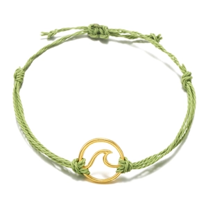 Detail of sage green braided beach bracelet with golden wave charm and adjustable knot