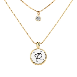 Detail of double-layer gold necklace featuring a diamond pendant and letter D badge