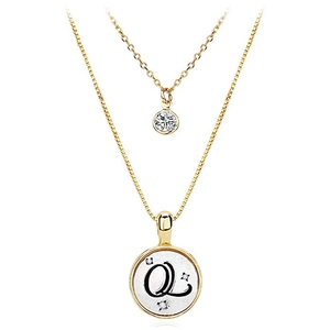Close-up of double-layer necklace set with letter Q pendant and sparkling zircon