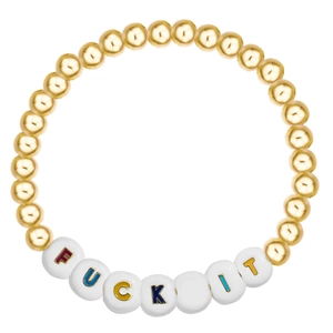 Close-up of golden beaded bracelet with colorful FUCK IT letter beads and elastic string
