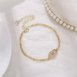 Double-layer gold plated bracelet with cubic zirconia evil eye charm and lobster clasp