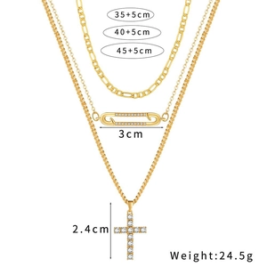 Golden 3-piece layered necklace set with paperclip chain and zircon cross pendant