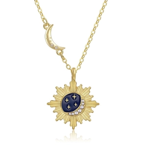 Star and moon gold necklace with sunburst pendant and blue enamel starburst details