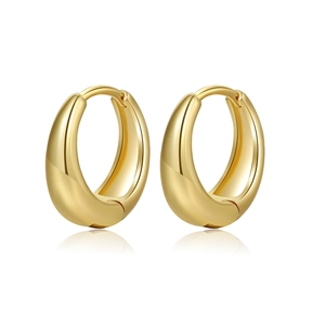 Macro shot of chunky gold plated hoop earrings with high polish and hinged snap closure