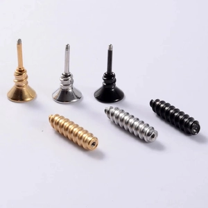 Detailed view of punk screw stud earrings in gold, silver, and black stainless steel