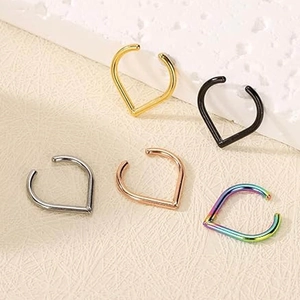 Set of heart-shaped stainless steel fake septum nose rings in five assorted metallic finishes