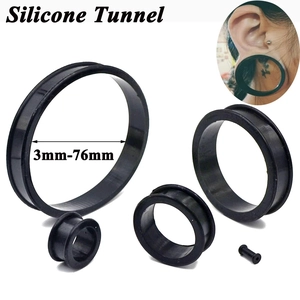 Detailed size guide for black silicone ear tunnels ranging from 3mm up to 76mm diameter