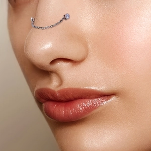 Silver 316L stainless steel chain labret with purple CZ stone on female model
