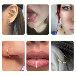 Vista detallada de aros de acero inoxidable usados en oreja, nariz, labios y lengua