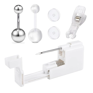 Detailed set of 6-piece disposable belly piercing guns with stainless steel rings and pads