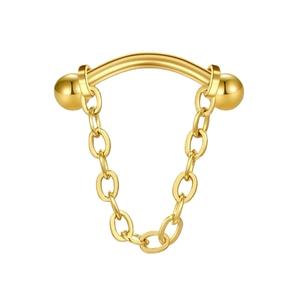 Macro detail of golden curved barbell lip ring featuring high-polished metal chains