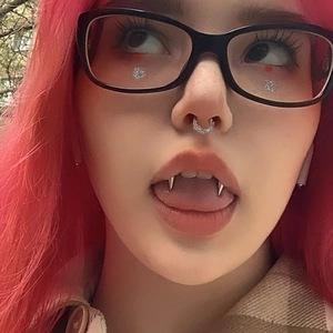 Dracula smile piercing jewelry with silver vampire fang design for subculture style