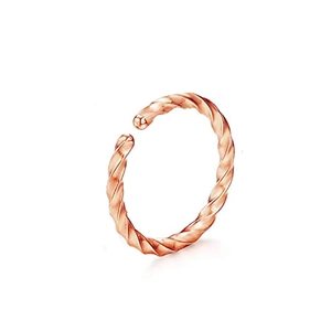Detail view of rose gold twisted hoop featuring a sleek spiral texture and open design