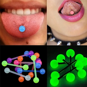 Detailed views of luminous acrylic tongue rings in assorted colors with glow-in-the-dark effect