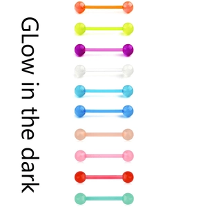 Detailed set of colorful glow in the dark acrylic tongue rings with soft barbell shafts