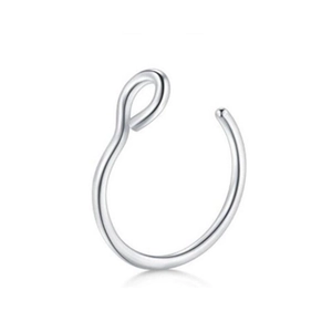 Macro view of a polished silver stainless steel U-shaped clip-on nose ring with ball end