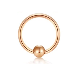 Detailed close-up of rose gold horseshoe captive bead ring with polished finish