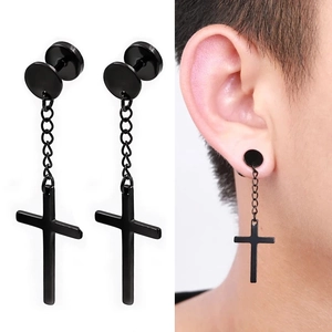 Detail of black stainless steel cross earrings with chains showing macro textures