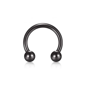 Detail of horseshoe captive bead ring in black plated steel for body piercing jewelry