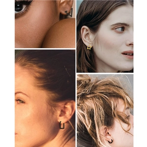 Gros plan de boucles d'oreilles géométriques en acier titane aux formes variées