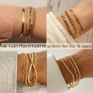 Detailansicht von 14K vergoldeten Armband-Sets mit verschiedenen Gliederketten am Handgelenk