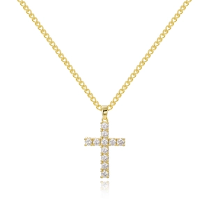 Macro shot of gold-plated cross pendant necklace with sparkling cubic zirconia stones