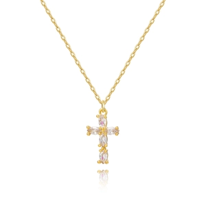 Macro detail of gold cross pendant featuring marquise-cut white zircon on a fine chain