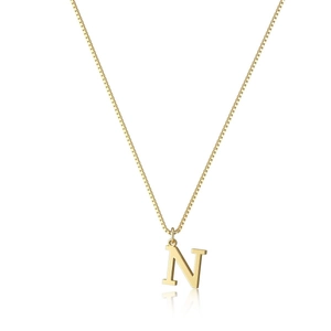 Detail shot of a polished gold letter N pendant with a fine box chain and mirror reflection