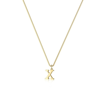 Macro detail of gold plated letter X pendant featuring a polished box chain necklace