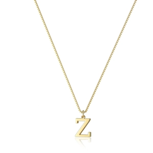 Detailed macro shot of a gold-plated letter Z pendant necklace with box chain