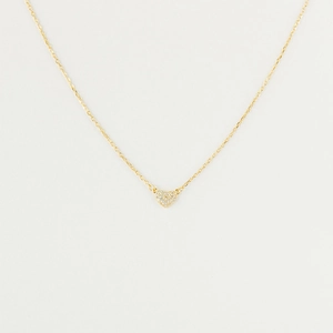 Detailed view of a gold heart pendant necklace with shimmering white zircon stones