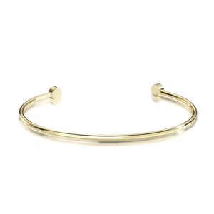 Detailed view of polished 14k gold plated minimalist open cuff bracelet with flat ends