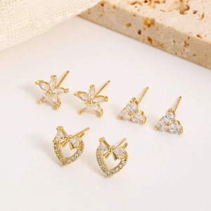 Three pairs of 16K gold plated minimalist stud earrings with stars and heart shapes