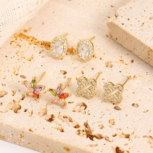 Exquisite 3-pair earring set featuring 16K gold plated floral and oval crystal designs
