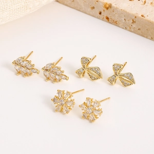 Detail of 16K gold plated stud earring set with wheat leaf and bowknot designs