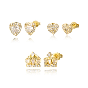 Detail of 16K gold plated stud earring set with heart and crown designs on white background