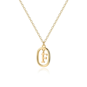 Detailed close-up of a gold-plated letter F pendant on a delicate O-link chain necklace