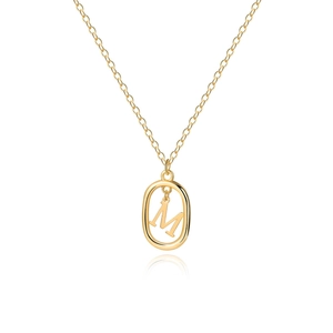 Detail of minimalist 18K gold plated oval pendant featuring a capital letter M charm