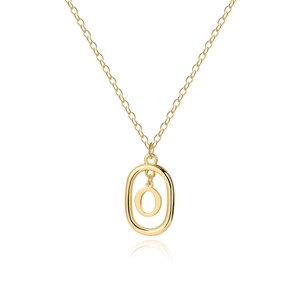 Close-up of golden necklace with double oval letter O pendant on white background