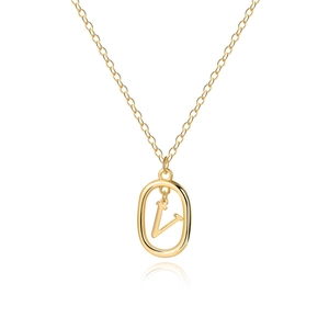 Detailed macro view of 18K gold letter V pendant on a sleek minimalist chain