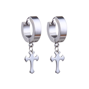 Macro detail of silver stainless steel cross drop earrings with circular hoop clasp