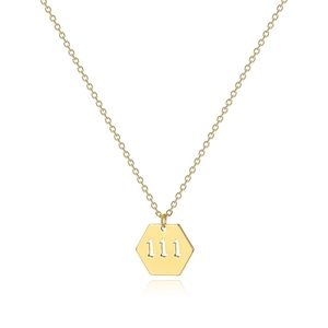 Detailed view of gold hexagon angel number 111 pendant on a delicate chain with reflection